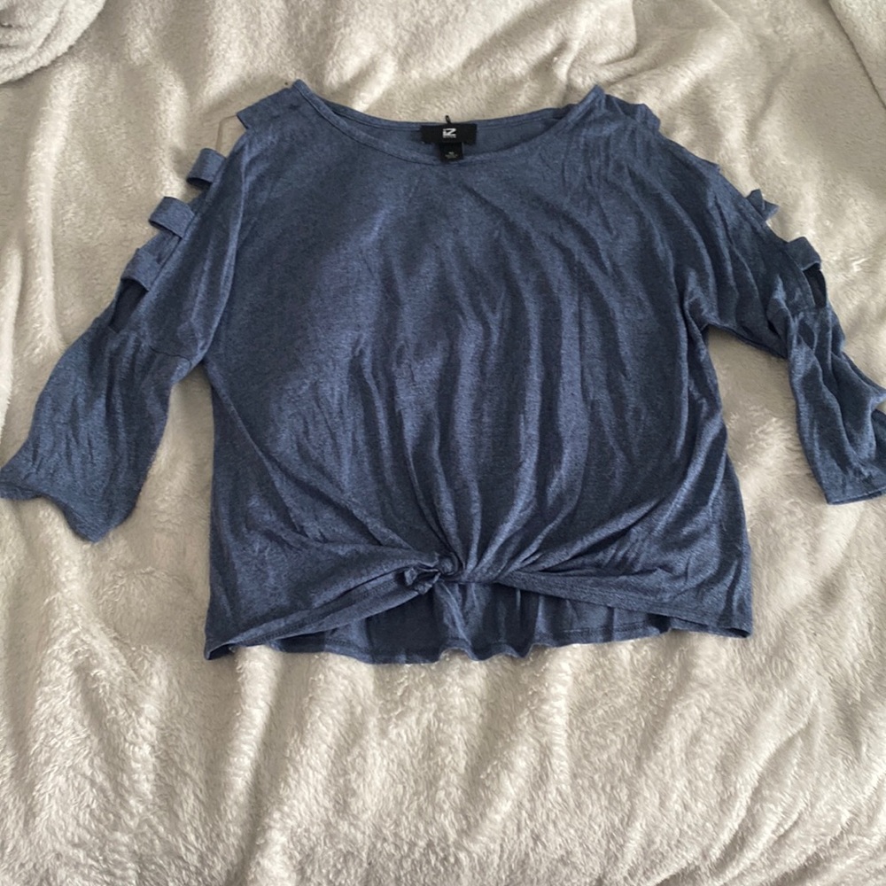 blue blouse with arm cut outs